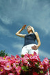 Teenage girl shielding her face