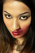 Photo: Woman with red lipstick smudged around her lips Woman with red lipstick smudged around her lips