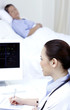 Doctor checking electrocardiogram