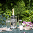 Foto: Table preparation with a bottle of wine Table preparation with a bottle of wine