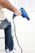 A man holding power drill