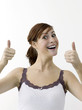 Happy woman showing double thumbs up