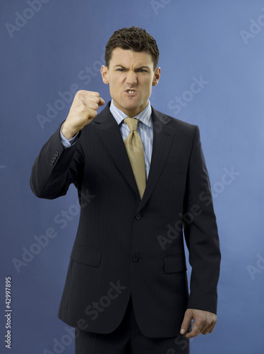 Photo: Serious- looking businessman Serious- looking businessman