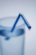 Drinking straw in a glass of water