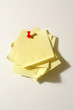 Notes fastened with a map pin