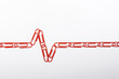 Red plastic-coated paper clips
