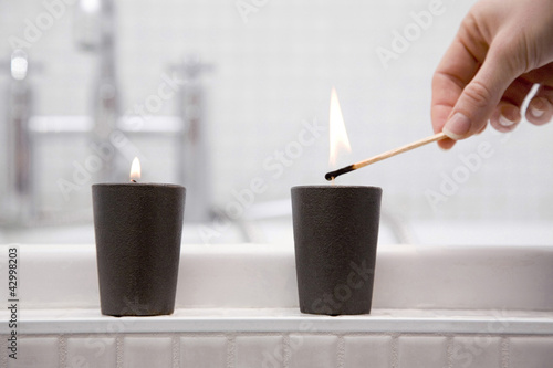 Photo: Lighting a candle Lighting a candle
