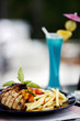 Grilled meat and fries