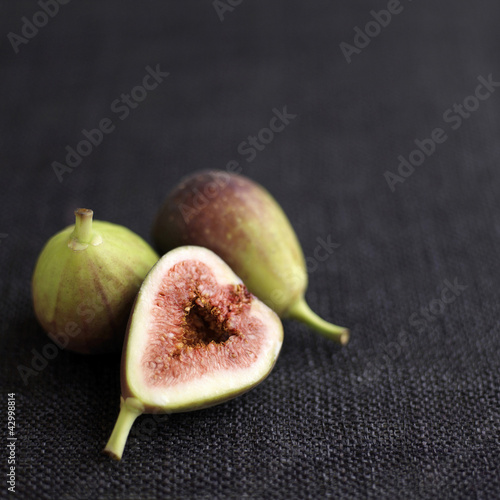 Photo: Close up of some figs on table Close up of some figs on table