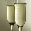 Side view of two glasses of champagne