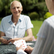 Senior couple playing cards