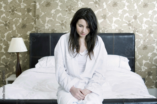 Photo: A sick woman in her bedroom A sick woman in her bedroom