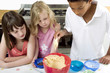 Kids learning baking