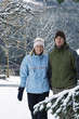 Couple walking outdoor in winter clothing