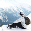 Male snowboarder with backpack