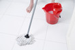 Woman mopping the floor