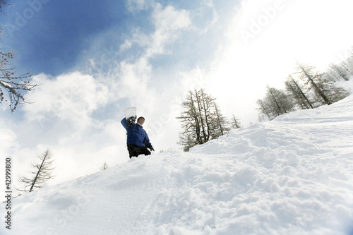 Photo: Man with his snowboard Man with his snowboard