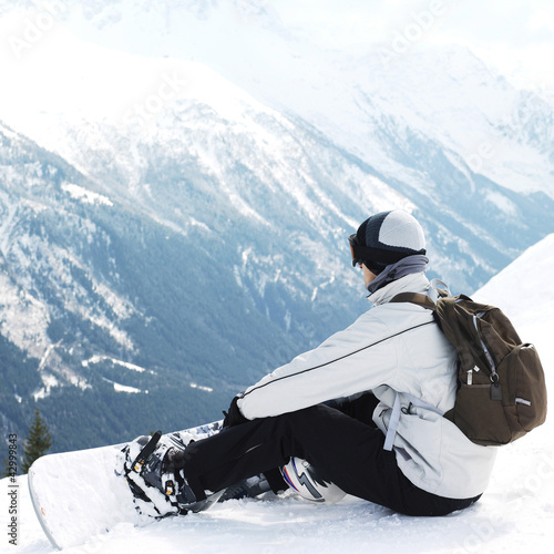 Photo: Male snowboarder with backpack Male snowboarder with backpack