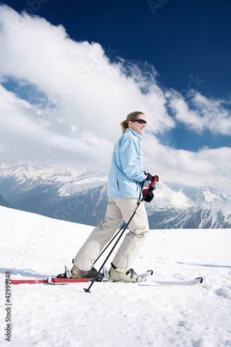 Photo: Female skier on skis Female skier on skis