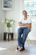 Man sitting on a chair in the living room