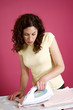 Photo: Woman ironing clothes Woman ironing clothes