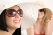 Photo: Women with hats and sunglasses Women with hats and sunglasses