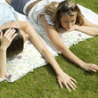 Photo: Women lying forward in the park Women lying forward in the park