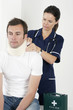 Female nurse treating a patient