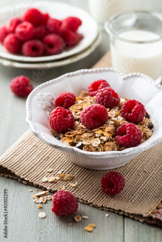 Photo: Muesli with fresh raspberries and dried fruits Muesli with fresh raspberries and dried fruits