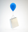 Balloon lifting a shopping bag