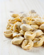 Making homemade tortellini