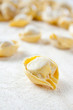 Making homemade tortellini