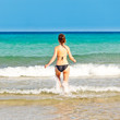 Photo: Young woman on the beach Young woman on the beach