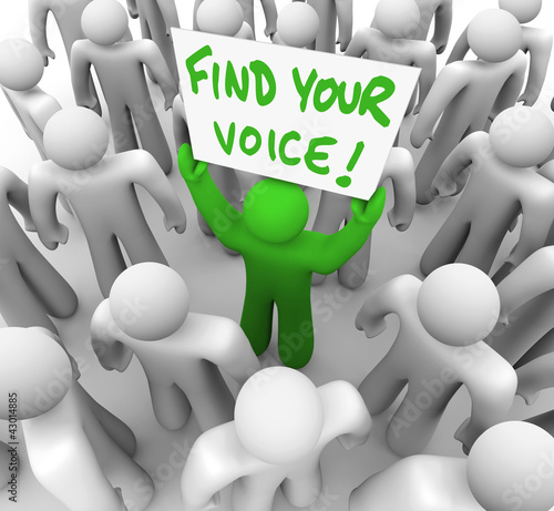 Illustration: Find Your Voice Man Holding Sign in Crowd - Confidence Find Your Voice Man Holding Sign in Crowd - Confidence