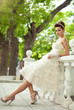 Foto: very beautiful brunette in a wedding dress. very beautiful brunette in a wedding dress.