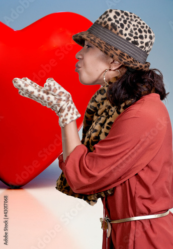 Photo: Woman Blowing a Kiss Woman Blowing a Kiss