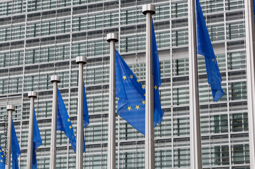 Photo: European Union flags of Berlaymont building in Brussels European Union flags of Berlaymont building in Brussels