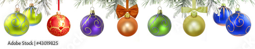 Photo: Christmas banner with green tree and baubles isolated Christmas banner with green tree and baubles isolated