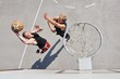 Two basketball players on the court