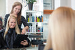 Customer with Digital Tablet at Hair Salon