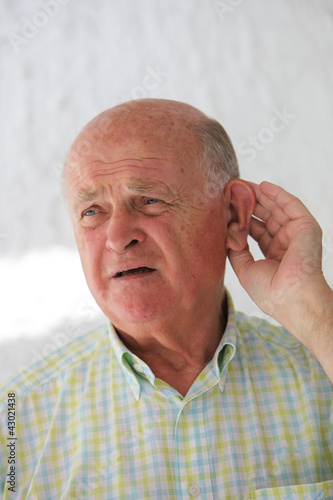 Photo: Elderly man hard of hearing Elderly man hard of hearing
