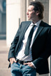 Confident young business man portrait outdoor.