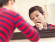 LIttle Boy Brushing Teeth in Mirror