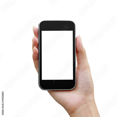 Photo: Modern mobile phone in a woman hand isolated Modern mobile phone in a woman hand isolated