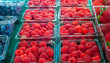 Photo: Array of berries on display at a produce market Array of berries on display at a produce market