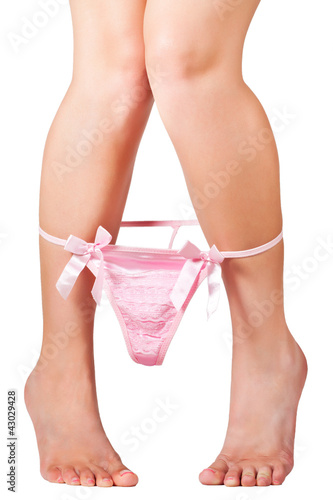 Photo: girl's legs with lowered pink panties girl's legs with lowered pink panties
