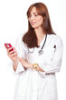 female doctor standing and holding a cellphone