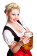 junge blonde Frau im Dirndl mit Masskrug