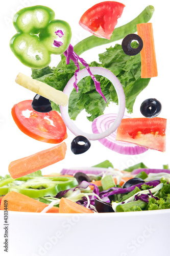 Photo: fresh vegetables falling fresh vegetables falling