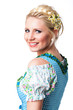 junge blonde Frau im Dirndl, über die Schulter schauend